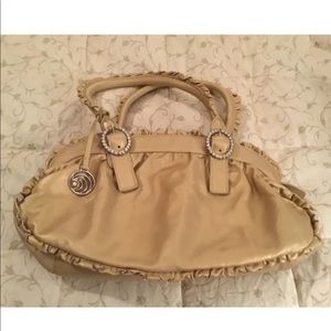 Gold ruffled handbag